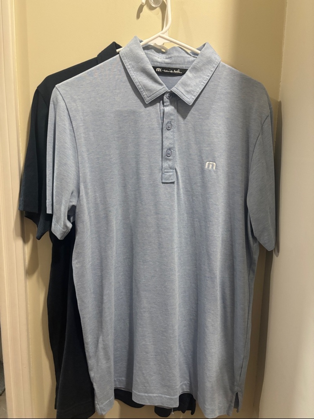 2 Men’s size medium Travis Matthew polo